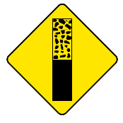 This sign indicates paved road ends ahead
