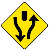 This sign indicates the road ahead is divided by a median keep to the right